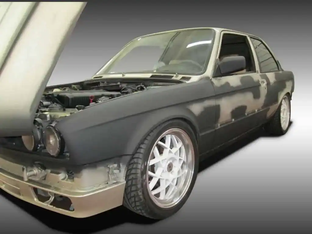 beat up BMW before vehicle wrap